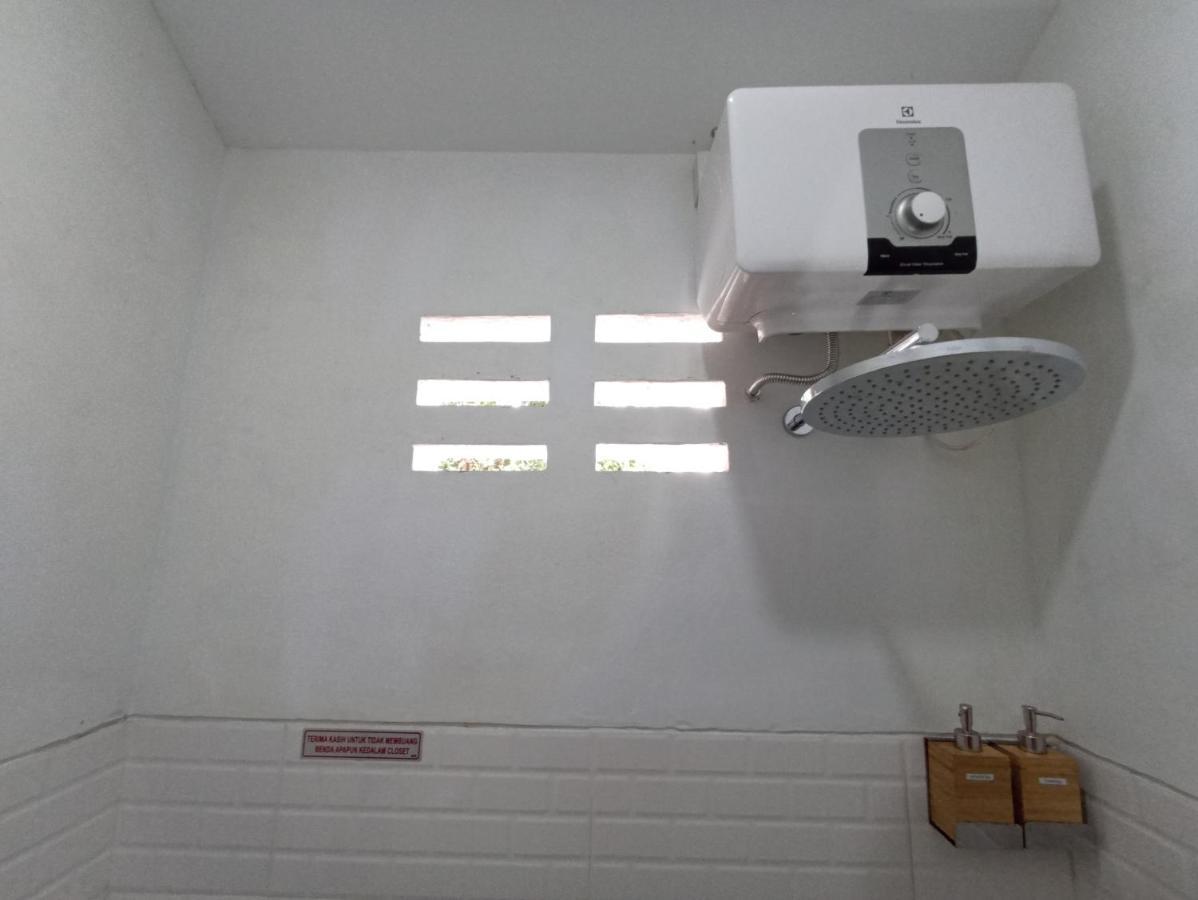 Mruyung Guest House Kota Lama Banyumas Mitra Reddoorz Zewnętrze zdjęcie